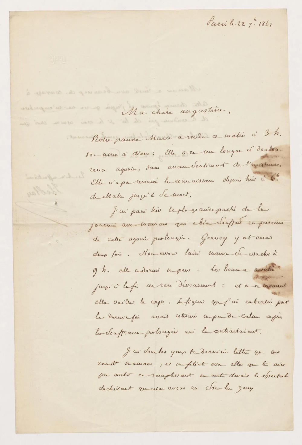 Première page d’une lettre manuscrite datée de Paris et adressée à Augustine, encre brune sur papier taché, marqué par la transparence du verso.