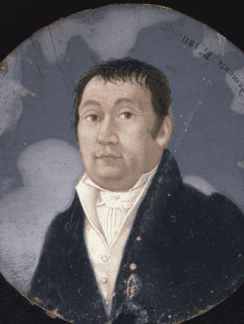 Petit portait rond présentant un homme brun vêtu à la mode du Premier Empire.