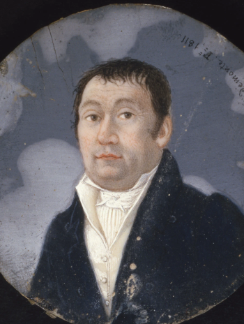 Petit portait rond présentant un homme brun vêtu à la mode du Premier Empire.