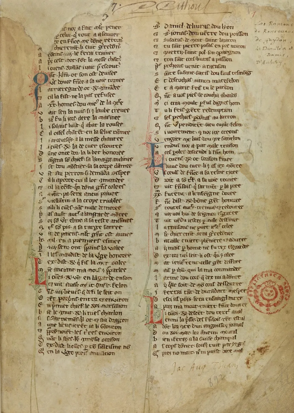 Manuscript text in medieval French in two columns with a red stamp reading Bibliotheca regia.
