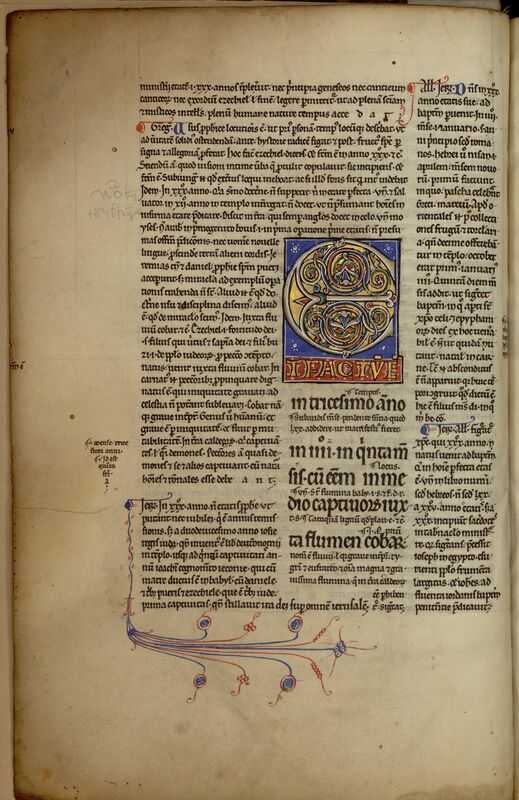 MS 157, f. 2v. Page d'un manuscrit médiéval : texte à trois modules ; au centre de la page, initiale E ornée marquant le début du texte "E/TFACTVE", à décor de rinceaux bleu, rouge et vert sur fond or, dans un encadrement à fond bleu, sous l'encadrement lettres capitales dorées sur fond rouge ("TFACTVE"), en-dessous, colonne de texte (le plus gros module) avec glose interlinéaire (module le plus réduit) ; dans le reste de la page, texte de module "moyen" (glose marginale) ; dans la marge gauche (partie inférieure), note dessinant un triangle pointant vers le bas et pied-de-mouche bleu avec prolongement à décor filigrané bleu et rouge dans la marge inférieure.